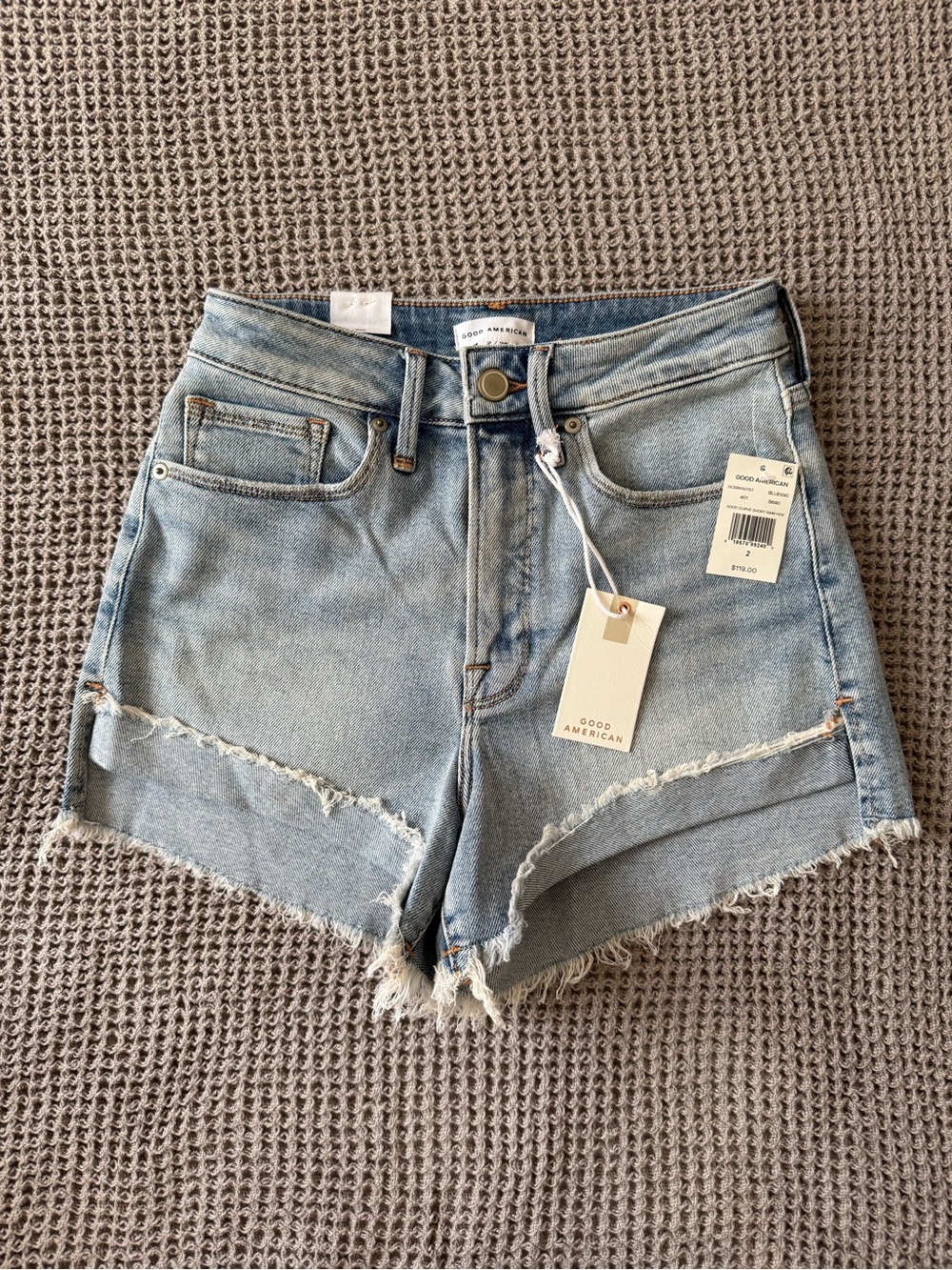 Good American Washed Light Blue Distressed High-Rise Jean Shorts